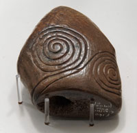 The Garboldisham Macehead in its display case at West Stow Gallery.