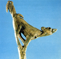 Spear thrower carved into ornamental Ibex shape.