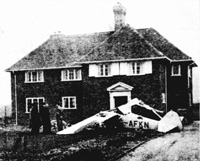 Crashed Taylorcraft G-AFKN hitting three houses in Westley Road on 1/03/1939.