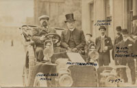 Annotated postcard from 1907 showing dignitaries outside the Pageant HQ on Angel Hill.