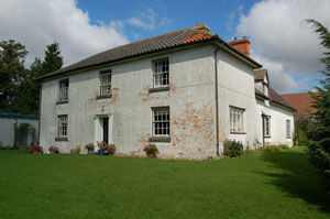 The original farmhouse seen in 2008