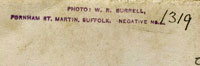 Example of Burrell's rubber stamp and its use. This one is on a card of boxers facing off, and must date to 1914.